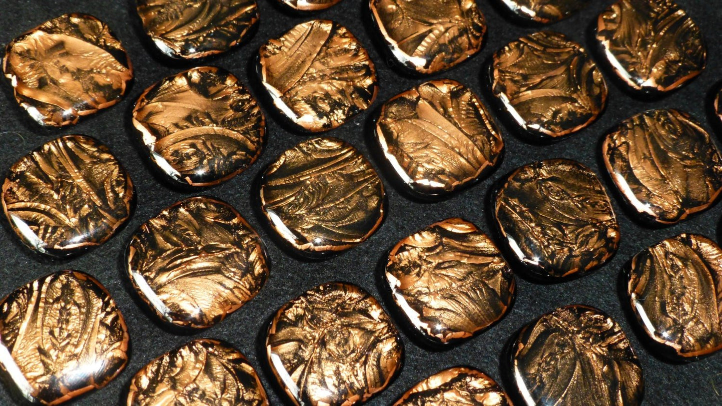 Display of multiple round copper drawer pulls with elegant frost pattern and shine. - Ann Ivory Studios