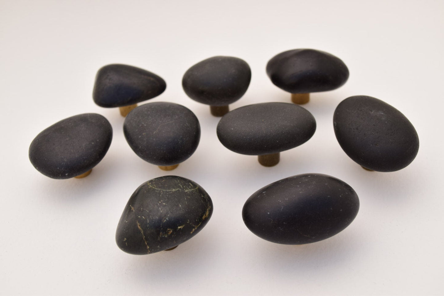 9 Stone Cabinet Knobs showing variations in colors - Brass Base - Natural Mountain Midnight - Ann Ivory Studios