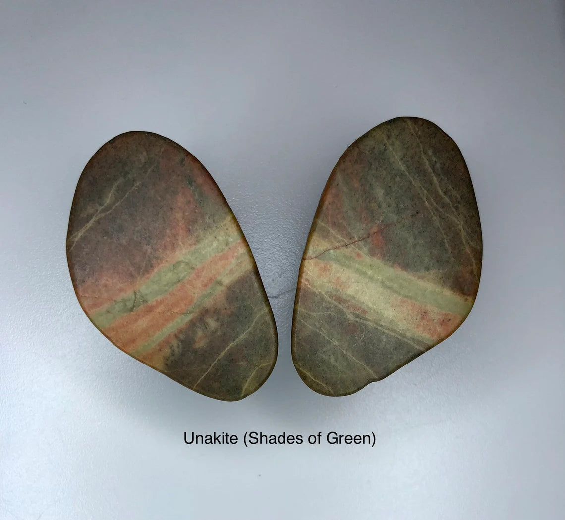 A pair of sliced stone knobs with Unakite shades of green.